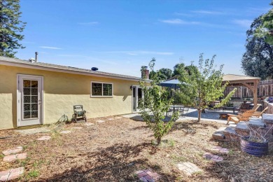 Welcome to your next chapter! This warm and inviting 4-bedroom on Carlton Oaks Country Club in California - for sale on GolfHomes.com, golf home, golf lot
