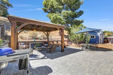 Welcome to your next chapter! This warm and inviting 4-bedroom on Carlton Oaks Country Club in California - for sale on GolfHomes.com, golf home, golf lot