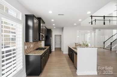 Wake up to sweeping golf course scenery at Verdict Ridge in this on Verdict Ridge Golf and Country Club in North Carolina - for sale on GolfHomes.com, golf home, golf lot