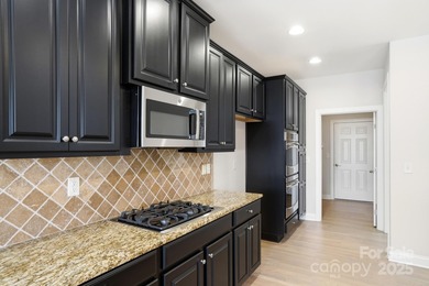 Wake up to sweeping golf course scenery at Verdict Ridge in this on Verdict Ridge Golf and Country Club in North Carolina - for sale on GolfHomes.com, golf home, golf lot