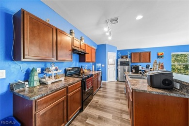 Modern 2017-Built Home in Lehigh Acres! Welcome to this on River Hall Country Club in Florida - for sale on GolfHomes.com, golf home, golf lot