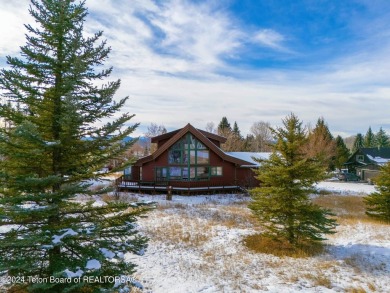 Discover this delightful Star Valley Ranch home boasting over 2 on Star Valley RV Golf Course in Wyoming - for sale on GolfHomes.com, golf home, golf lot