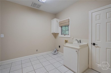 Don't miss this centrally located island home offering one level on The Landings Club - Marshwood in Georgia - for sale on GolfHomes.com, golf home, golf lot