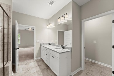 Built in 2022, this beautifully maintained home in the on The Highlands Course at Lake Arrowhead in Georgia - for sale on GolfHomes.com, golf home, golf lot