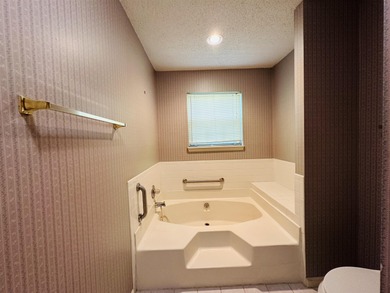 Welcome to this Charming 4-Bedroom 2-bath Single Family Home on Killearn Country Club and Inn in Florida - for sale on GolfHomes.com, golf home, golf lot