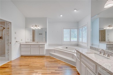 Don't miss this centrally located island home offering one level on The Landings Club - Marshwood in Georgia - for sale on GolfHomes.com, golf home, golf lot