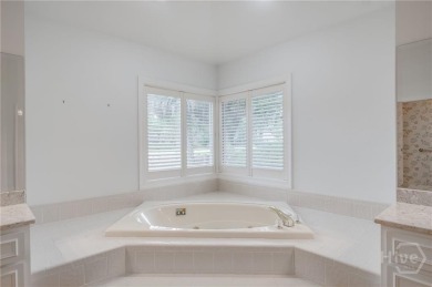 Don't miss this centrally located island home offering one level on The Landings Club - Marshwood in Georgia - for sale on GolfHomes.com, golf home, golf lot