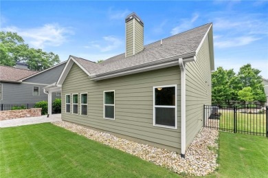 Built in 2022, this beautifully maintained home in the on The Highlands Course at Lake Arrowhead in Georgia - for sale on GolfHomes.com, golf home, golf lot