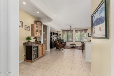 This popular Gala model in Sun City Festival is perfectly on Copper Canyon Golf Club in Arizona - for sale on GolfHomes.com, golf home, golf lot