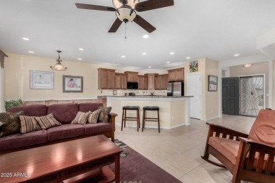 This popular Gala model in Sun City Festival is perfectly on Copper Canyon Golf Club in Arizona - for sale on GolfHomes.com, golf home, golf lot