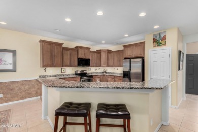 This popular Gala model in Sun City Festival is perfectly on Copper Canyon Golf Club in Arizona - for sale on GolfHomes.com, golf home, golf lot