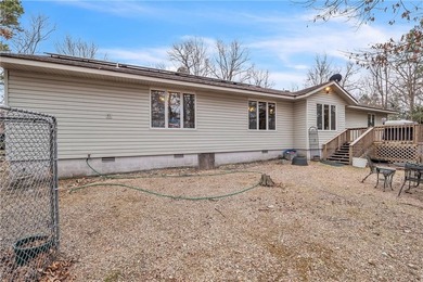 Nice 3 bedroom 2 bath home on wooded lot close to the country on Holiday Island Golf Course in Arkansas - for sale on GolfHomes.com, golf home, golf lot