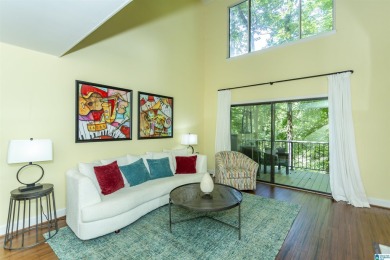 This home sits nestled in a wooded setting and water vista view on Inverness Country Club in Alabama - for sale on GolfHomes.com, golf home, golf lot