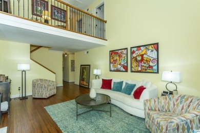 This home sits nestled in a wooded setting and water vista view on Inverness Country Club in Alabama - for sale on GolfHomes.com, golf home, golf lot