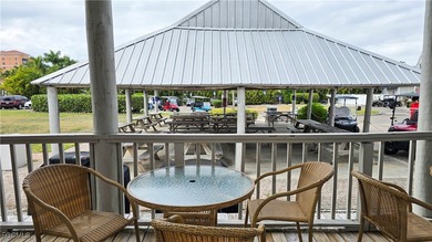 Bright and spacious well-appointed 2-bedroom, 2-bath end-unit on Burnt Store Golf Club in Florida - for sale on GolfHomes.com, golf home, golf lot