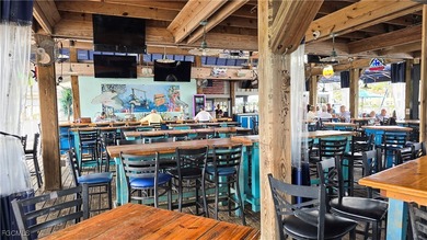 Bright and spacious well-appointed 2-bedroom, 2-bath end-unit on Burnt Store Golf Club in Florida - for sale on GolfHomes.com, golf home, golf lot