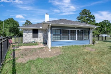 Discover this gorgeous 3-bedroom, 2-bathroom home in the coveted on Whispering Pines Golf Club in Texas - for sale on GolfHomes.com, golf home, golf lot