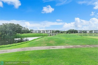 *ALL ASSESSMENTS HAVE BEEN PAID*EXPERIENCE THE ULTIMATE IN on Wynmoor Golf Course in Florida - for sale on GolfHomes.com, golf home, golf lot