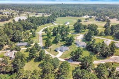 Discover this gorgeous 3-bedroom, 2-bathroom home in the coveted on Whispering Pines Golf Club in Texas - for sale on GolfHomes.com, golf home, golf lot