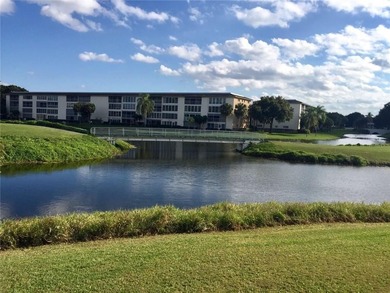 Experience luxurious living in this beautifully remodeled open on Wynmoor Golf Course in Florida - for sale on GolfHomes.com, golf home, golf lot