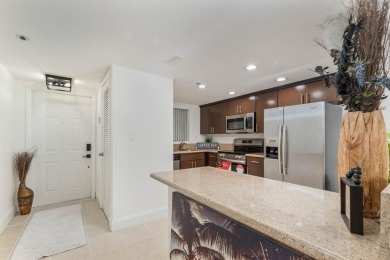 RARELY AVAILABLE first floor, corner unit in the quiet, sought on Grande Oaks Golf Club in Florida - for sale on GolfHomes.com, golf home, golf lot