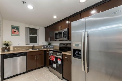 RARELY AVAILABLE first floor, corner unit in the quiet, sought on Grande Oaks Golf Club in Florida - for sale on GolfHomes.com, golf home, golf lot