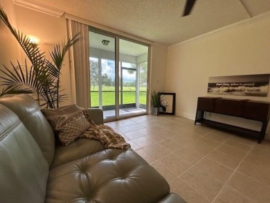 RARELY AVAILABLE first floor, corner unit in the quiet, sought on Grande Oaks Golf Club in Florida - for sale on GolfHomes.com, golf home, golf lot