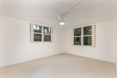 RARELY AVAILABLE first floor, corner unit in the quiet, sought on Grande Oaks Golf Club in Florida - for sale on GolfHomes.com, golf home, golf lot