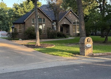 Beautiful updated golf course home on #16 green and #17 tee box on Pinnacle Golf and Boat Club in Texas - for sale on GolfHomes.com, golf home, golf lot