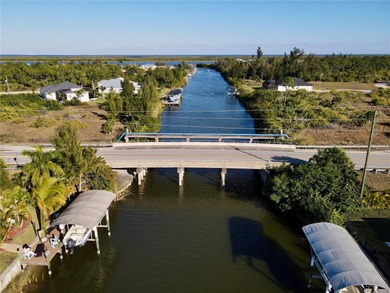 WATERFRONT CLEARED LOT | ONE BRIDGE TO OPEN WATER | 80' OF WATER on Rotonda Golf and Country Club - Long Marsh  in Florida - for sale on GolfHomes.com, golf home, golf lot