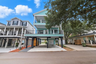 Immaculate 4 bedroom 3.5 bath raised beach home located behind on Prestwick Country Club in South Carolina - for sale on GolfHomes.com, golf home, golf lot
