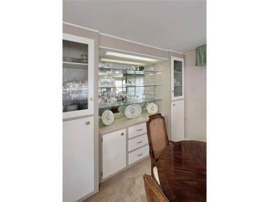 Welcome to this charming 2-bedroom, 2-bathroom home, ideally on Fairway Village Golf Course in Florida - for sale on GolfHomes.com, golf home, golf lot