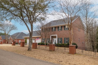 Nestled in a serene, wooded setting, this meticulously on Columbus Country Club in Mississippi - for sale on GolfHomes.com, golf home, golf lot