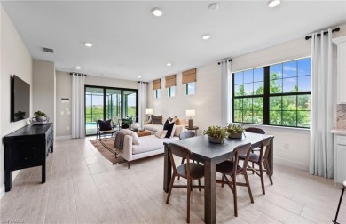 Enjoy low-maintenance, resort-style living in this beautifully on River Hall Country Club in Florida - for sale on GolfHomes.com, golf home, golf lot