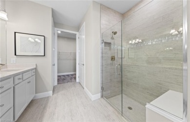 Enjoy low-maintenance, resort-style living in this beautifully on River Hall Country Club in Florida - for sale on GolfHomes.com, golf home, golf lot