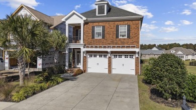 An exceptional four-bedroom, three-and-a-half-bathroom home on Myrtlewood Golf Course and Club  in South Carolina - for sale on GolfHomes.com, golf home, golf lot