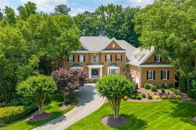 Enjoy refined living in this stately golf-front brick home in on Two Rivers Country Club in Virginia - for sale on GolfHomes.com, golf home, golf lot