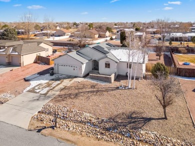 Beautifully landscaped home in the golf course area of Pueblo on Desert Hawk At Pueblo West in Colorado - for sale on GolfHomes.com, golf home, golf lot