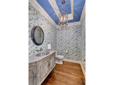 Enjoy refined living in this stately golf-front brick home in on Two Rivers Country Club in Virginia - for sale on GolfHomes.com, golf home, golf lot