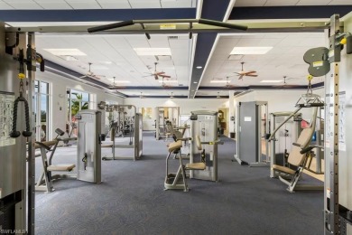 Enjoy low-maintenance, resort-style living in this beautifully on River Hall Country Club in Florida - for sale on GolfHomes.com, golf home, golf lot