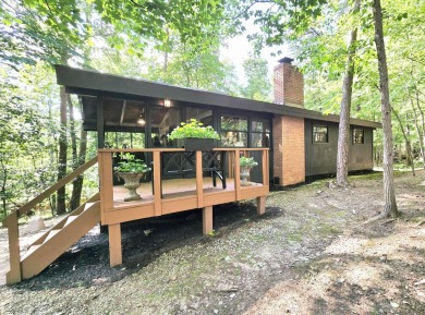 Welcome to your perfect cabin in the woods in Hide A-Way Hills! on Hide-A-Way Hills Golf Club in Ohio - for sale on GolfHomes.com, golf home, golf lot
