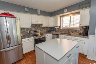 This comfy, cozy and conveniently located cottage-style ranch in on Burning Ridge Golf Course in South Carolina - for sale on GolfHomes.com, golf home, golf lot