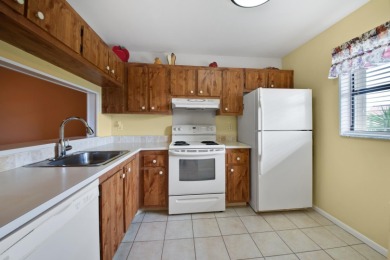 Spacious 2 bedroom, 2 bathroom condo in the desirable Lucerne on Forest Oaks Golf Club in Florida - for sale on GolfHomes.com, golf home, golf lot
