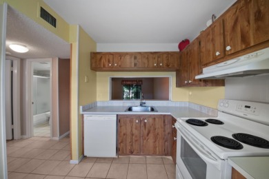 Spacious 2 bedroom, 2 bathroom condo in the desirable Lucerne on Forest Oaks Golf Club in Florida - for sale on GolfHomes.com, golf home, golf lot