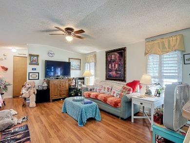 (Ver Espanol Abajo)  Lot rent $587 includes use of park on Lake Henry Golf Club in Florida - for sale on GolfHomes.com, golf home, golf lot