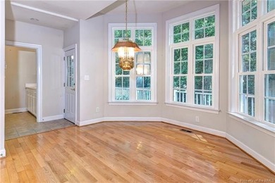 This classic brick Colonial offers enduring appeal paired with a on Fords Colony Country Club in Virginia - for sale on GolfHomes.com, golf home, golf lot