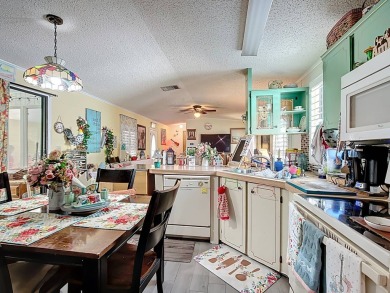 (Ver Espanol Abajo)  Lot rent $587 includes use of park on Lake Henry Golf Club in Florida - for sale on GolfHomes.com, golf home, golf lot