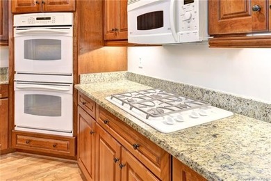 This classic brick Colonial offers enduring appeal paired with a on Fords Colony Country Club in Virginia - for sale on GolfHomes.com, golf home, golf lot