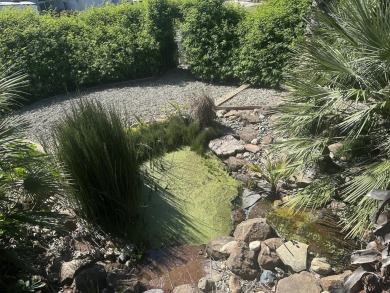 Every day can be a Vacation day amid this palm tree oasis! So on Gold Hills Golf Club in California - for sale on GolfHomes.com, golf home, golf lot