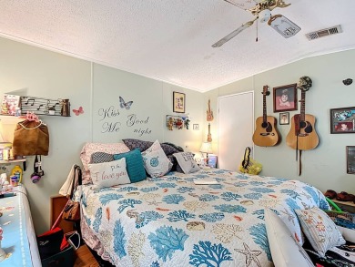 (Ver Espanol Abajo)  Lot rent $587 includes use of park on Lake Henry Golf Club in Florida - for sale on GolfHomes.com, golf home, golf lot